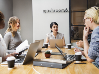 Men and women on a round table