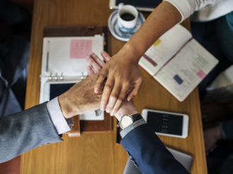 Men and women on a round table